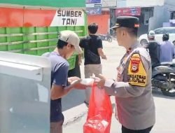 Jum’at Berkah, Polsek Kawasan Paotere berbagi Nasi D