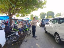 Ciptakan Kamseltibcar Lantas,Polsek Marbo Berikan Pengamanan di Pasar Tradisional Lengkese