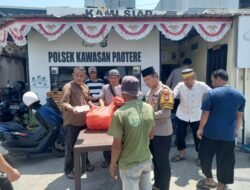 Berkah yang Menghangatkan Hati, Kapolsek Kawasan Paotere Bersama Personil Bagikan Nasi Kotak Usai Shalat Jumat