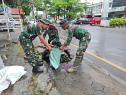 Jumat bersih, Personil Kodim 1409 Gowa bersihkan saluran air