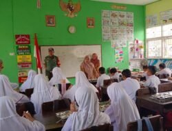Peduli Kesehatan Anak Sekolah, Babinsa Ramil 1409-05/Pallangga Dampingi Pembagian Makan Bergizi Gratis