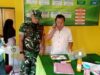 Babinsa Koramil 06 Bajeng Dampingi Satuan Pelayanan Pemenuhan Gizi di Sekolah-sekolah Wilayah Bajeng