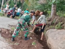 Sinergi TNI dan Warga Gowa: Babinsa Koramil Tompobulu Pimpin Karya Bhakti Perbaikan Jalan dan Saluran Air di Rannaloe