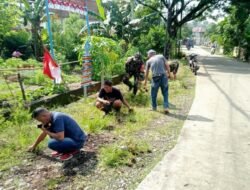 Perkuat Gotong Royong, Babinsa Bontomarannu Pimpin Karya Bakti di Kantor Desa dan Kebun PKK
