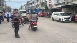 Cegah Kecelakaan Pelajar, Polres Pelabuhan Makassar Perketat Pengaturan Lalu Lintas di Depan Sekolah